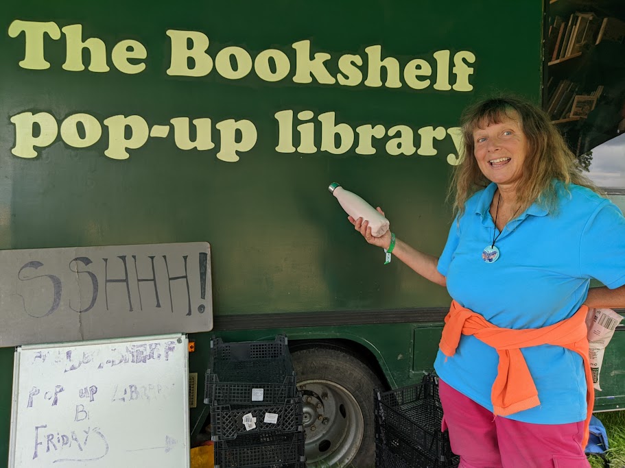 Book donation to mobile library at Green Gathering August 2023